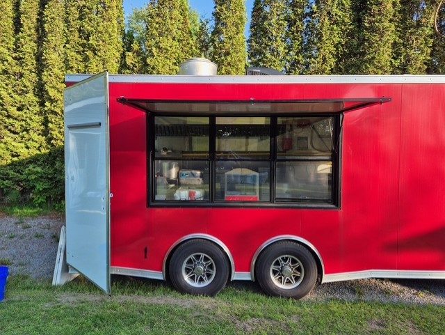 Hillside BBQ commercial food trailer with the serving window open